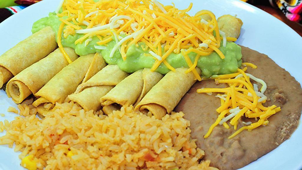 Rolled Tacos Plate (5 Pcs) · 5 beef rolled tacos with melted cheddar cheese on top and a side of rice and beans.