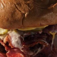 Fully Loaded Pastrami Burger · A quarter pound angus patty topped with a half pound of our pastrami provolone cheese, bacon...