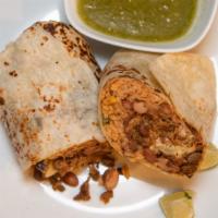 Burrito · Large flour tortilla filled with beans, rice, lettuce, sour cream, cheese, and guacamole.