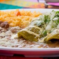 Enchiladas · Order of three lightly fried corn tortillas topped with sour cream, cojita cheese, onion, an...