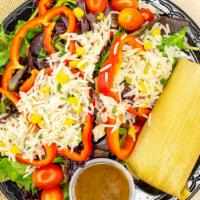 Tamale Salad · Large organic green salad, red peppers, roasted corn, tomatoes, sprinkled with cold basmati ...