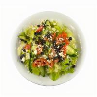 Greek Salad · Lettuce accompanied by tomatoes, cucumbers, onions, and olives, topped with feta cheese and ...