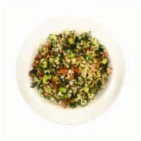Tabbouleh Salad · Bulgur mixed with chopped tomato, cucumber, onion and parsley dressed with our house citrus ...