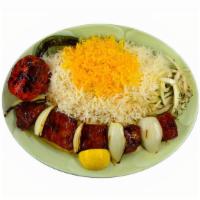 Lamb Shish Kabob · Chunks of marinated lamb charbroiled over open fire, served with grilled onions, basmati ric...