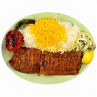Barg Kabob · A thin layer of filet mignon marinated in a secret sauce and charbroiled over open, served w...