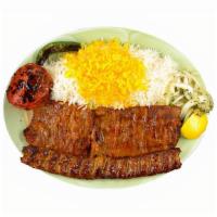 Soltani · 1 skewer of ground beef kabob paired with 1 skewer of barg kabob charbroiled over open fire,...