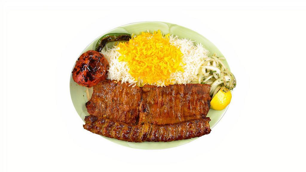 Soltani · 1 skewer of ground beef kabob paired with 1 skewer of barg kabob charbroiled over open fire, served with basmati rice topped with saffron flavored rice, grilled tomato, and serrano flavor.
