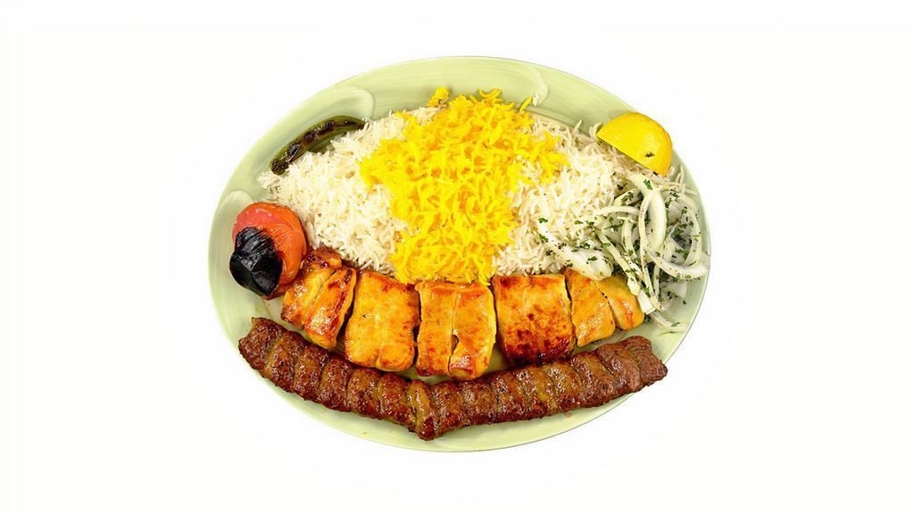 Chicken Kabob Soltani · 1 skewer of ground beef kabob paired with 1 skewer of boneless chicken kabob cooked over open fire, served with basmati rice topped with saffron flavored rice, grilled tomato, and serrano flavor.