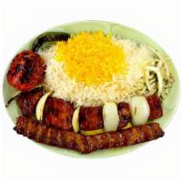 Lamb Shish Kabob Soltani · 1 skewer of ground beef kabob paired with 1 skewer of marinated lamb and grilled onions, ser...