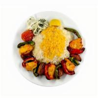 Bakhtiari Kabob · A skewer of shish and boneless chicken kabob alternated with bell peppers grilled over open ...