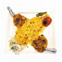 Bone-In Chicken Thigh · 2 large pieces of marinated bone-in chicken thigh charbroiled over open fire, served with sa...