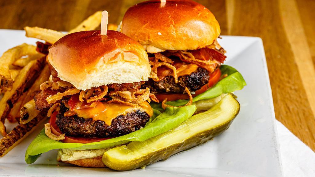 Burger Sliders · Topped with jalapeño, bacon jam, fried onion strings, lettuce, tomato, mayo and smoked cheddar.