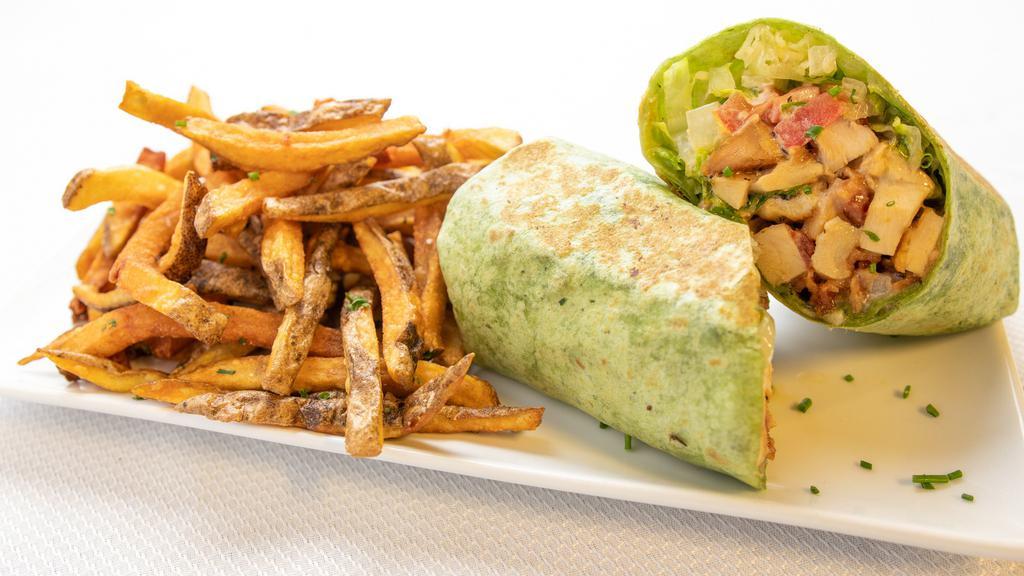 Chicken Bacon Ranch Wrap · Chicken Breast / Bacon / Romaine / Tomato / Provolone / Onion / Ranch Dressing 

Served with House-Cut Fries