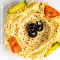 Hummus With Pita · Garbanzo bean tahini dip.