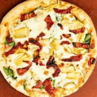 Florence Pizza · Roasted garlic spread, pizza sauce, spinach leaves, Mozzarella, sun-dried tomato, artichoke ...