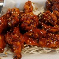 Honey Glazed Lollipop Wings · Spicy. Karaage style fried chicken wings in sweet and spicy sauce.