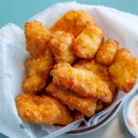 Cheese Curds** · Deep fried cheese curds with a side of spicy ranch