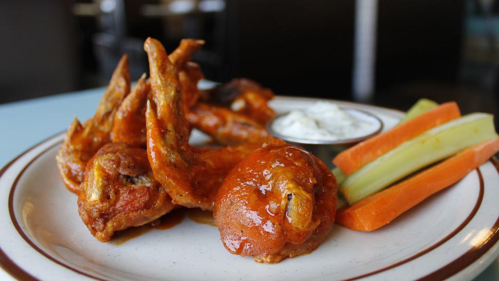 Buffalo Wings** · Whole buffalo wings served with a choice of Ranch or Blue Cheese