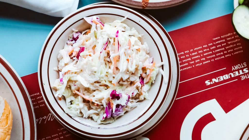 Coleslaw** · Tangy, mayo & vinegar-based homemade coleslaw made w/ red & green cabbage and carrots.
Allergens: Egg & soy