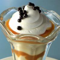 Butterscotch Pudding** · House made butterscotch pudding and caramel sauce, topped w/ fresh whipped cream and dark ch...