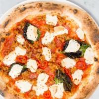 The Devil'S Pizza · Italian tomato sauce, fresh mozzarella, housemade spicy sausage, spicy Italian salami, and s...