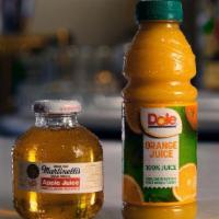 Orange Juice · Dole. 100% Juice.