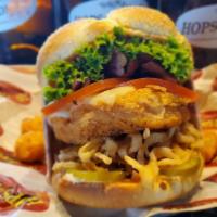 Triple Threat · This one brings the heat 3 ways with chipotle mayo, pepper Jack cheese and Cajun fried chick...