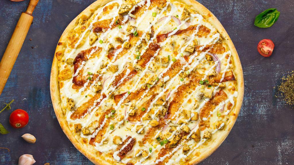 Cluckin' Bacon Ranch Pizza · Ranch base, grilled chicken, and bacon baked on a hand-tossed dough.