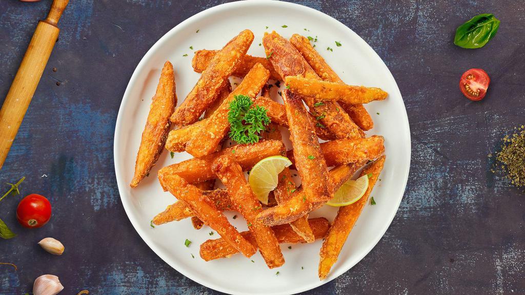 Sweet Spud Fries · Normal-sized crispy sweet potato fries garnished with salt.