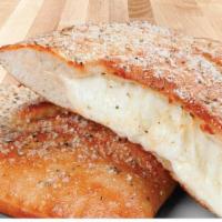 Lotza Mozza Calzone · A soft and chewy oven-baked pocket generously stuffed with lots of mozzarella cheese. Served...