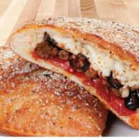 Classic Combo Calzone · A soft and chewy oven-baked pocket brushed with our signature sauce and stuffed with premium...