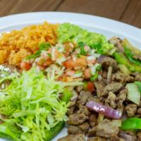 #7 - Carne Asada Plate · Diced Steak or grilled chicken with mex salsa, guacamole, lettuce & tortillas.