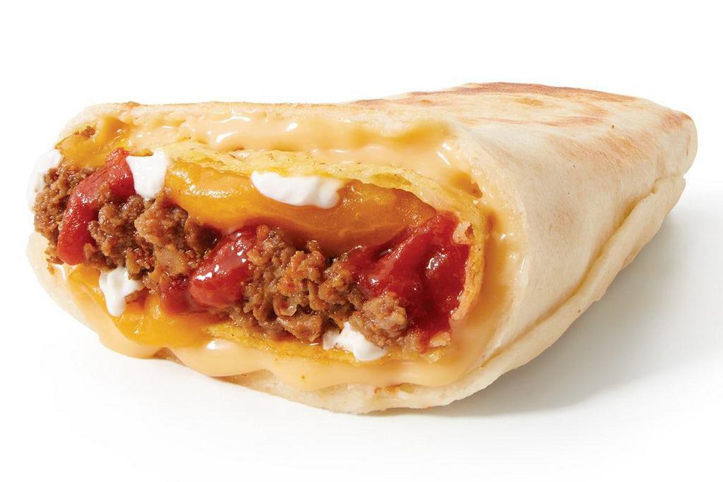 Stuffed Grilled Taco · A Crispy Shell stuffed with our delicious Seasoned Ground Beef (or upgrade to juicy Sirloin Steak), a blend of Cheeses, Hot Sauce, Sour Cream and Crunchy Tortilla Chips - all wrapped up AND grilled in a Flour Tortilla.