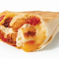 Grilled Burrito · Takes flavorful ingredients - Chile Lime Grilled Chicken, Creamy Ranch, Cheddar Cheese and P...
