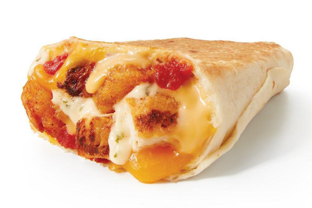 Grilled Burrito · Takes flavorful ingredients - Chile Lime Grilled Chicken, Creamy Ranch, Cheddar Cheese and Potato Olés®, Loaded into a Flour Tortilla and grilled to melt all of the flavors together.