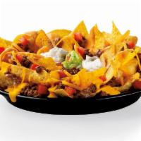 Super Nachos · Freshly fried Tortilla Chips, covered in Nacho Cheese, your choice of protein, Refried Beans...