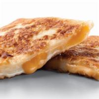 Quesadillas · A warm Flour Tortilla and a Blend of Cheeses, grilled and melted to perfection!.