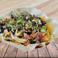 Nachos/ Fries Locas · These Tasty Nachos/Fries come with (Choose Your Meat), Pico ce Gallo, Sour Cream, Guacamole,...