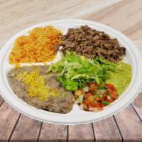 Asada Combo Plates Locos · Steak. Served with rice and beans, lettuce, guacamole, pico de gallo, and choice of flour or...