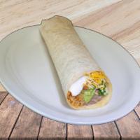 Supreme Burrito · Pinto beans, fried rice, guacamole, pico de gallo, lettuce, sour cream and cheese.