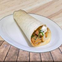 Fish Burrito · Fish, pico de gallo, lettuce, rice and a creamy jalapeno sauce.