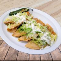 Five Crunchy Potato Tacos Special Locos · Crunchy potato tacos with lettuce, queso fresco, sour cream, green salsa, and red salsa adde...
