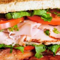 Baggins Club · Roasted turkey breast, crisp bacon, lettuce, red onions, tomatoes and mayo on toasted Italia...
