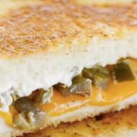 Jalapeno Popper Grilled Cheese Sandwich · Perfectly melted Cheddar cheese and cream cheese and chopped jalapeños on Italian white.