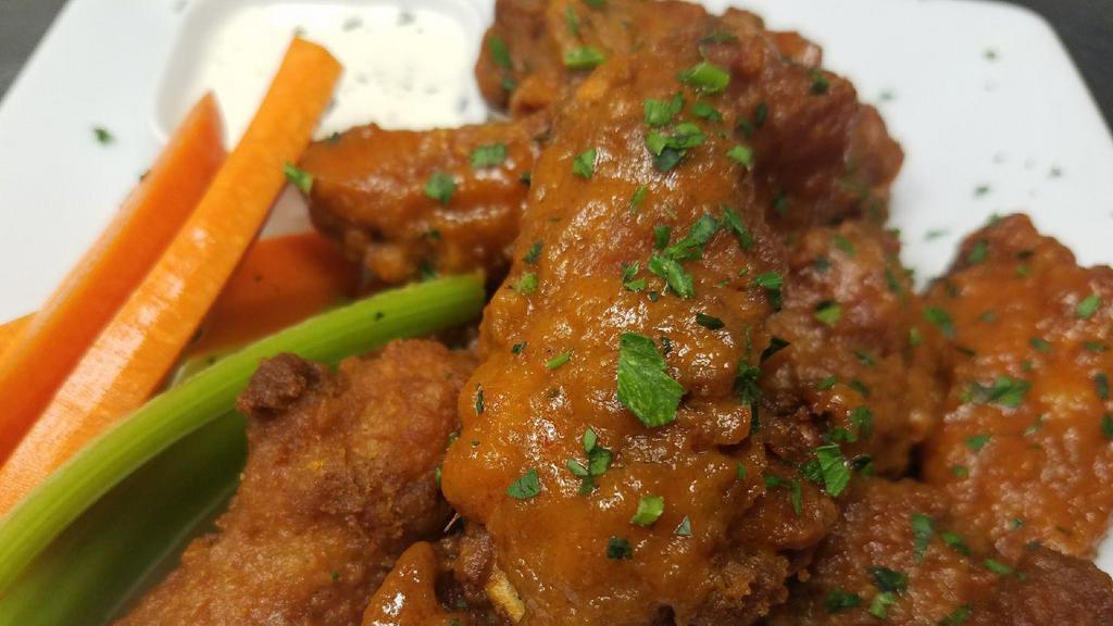 Chicken Wings · Plain, mild, medium, BBQ or Italian style, served with ranch or blue cheese