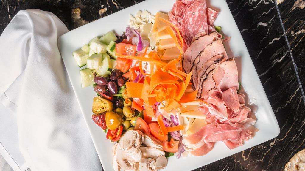 Cold Antipasto · Italian meats, domestic and imported olives and vegetables served with Italian dressing.