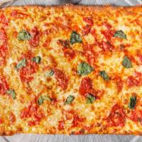 Grandma Pie · Thin crust topped with plum tomatoes, fresh housemade mozzarella cheese and basil