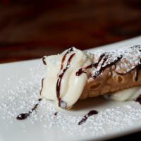Grande Cannoli · Pastry shell with sweet cream filling and semi-sweet chocolate chips
