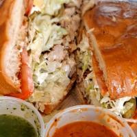 Tortas · Mexican sandwich with a choice of meat, garnished with lettuce, tomato, onion, avocado, pick...