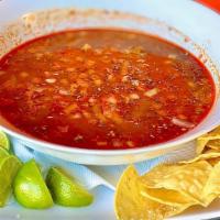 Menudo (32 Oz) · A traditional Mexican soup, cooked with tripe meat in broth with guajillo chili base, hominy...
